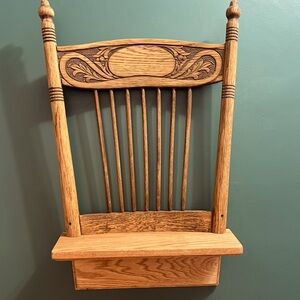 Newly Handcrafted wooden shelf designed with repurposed chair back.